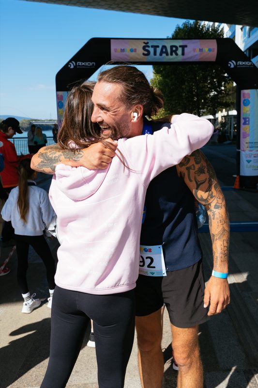 A hug at the finish line