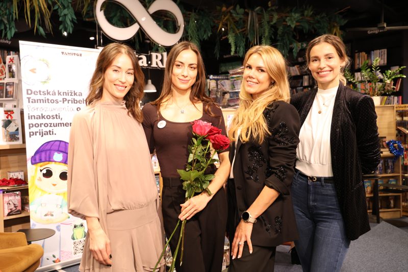 Guests with roses after the launch